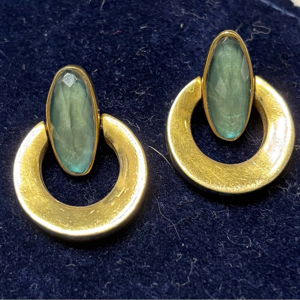 Steve Vaubel door knock with blue quartz earrings.